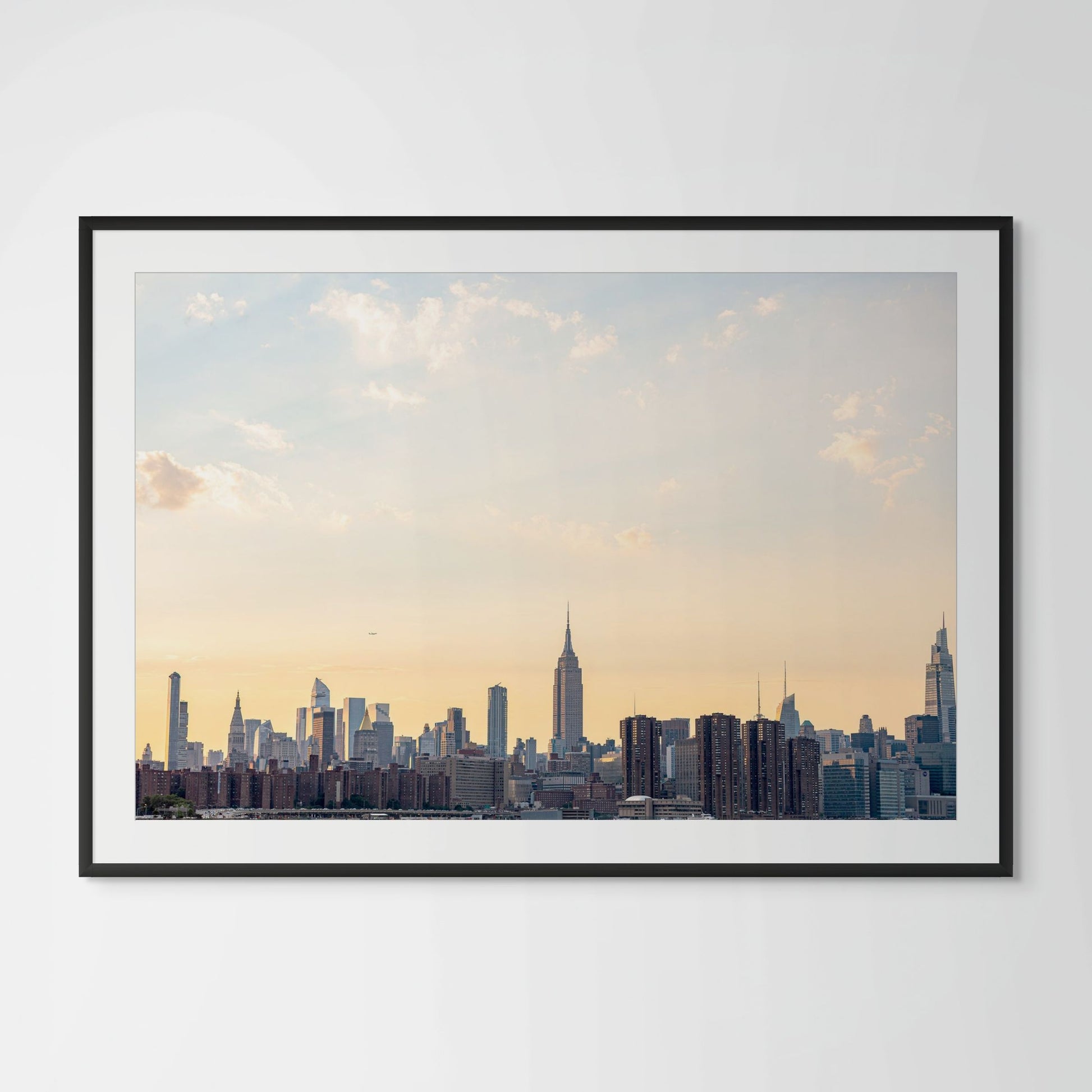 Manhattan skyline framed photography print in black wood frame with white mat