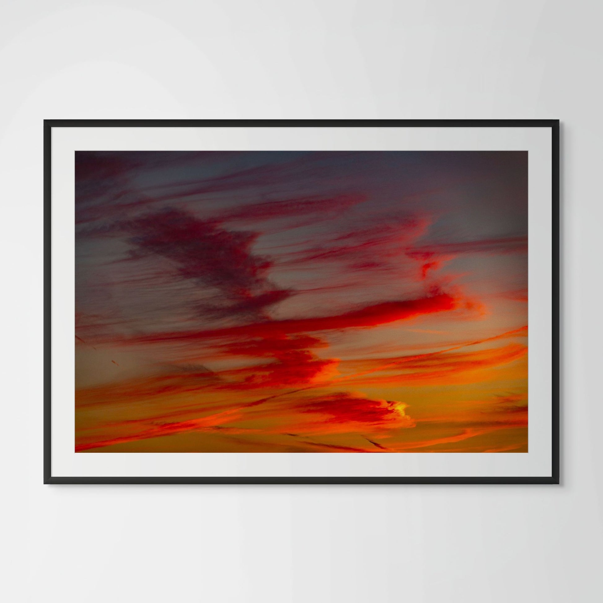 Sunset Hills cloud photography framed print in black wood frame with white mat