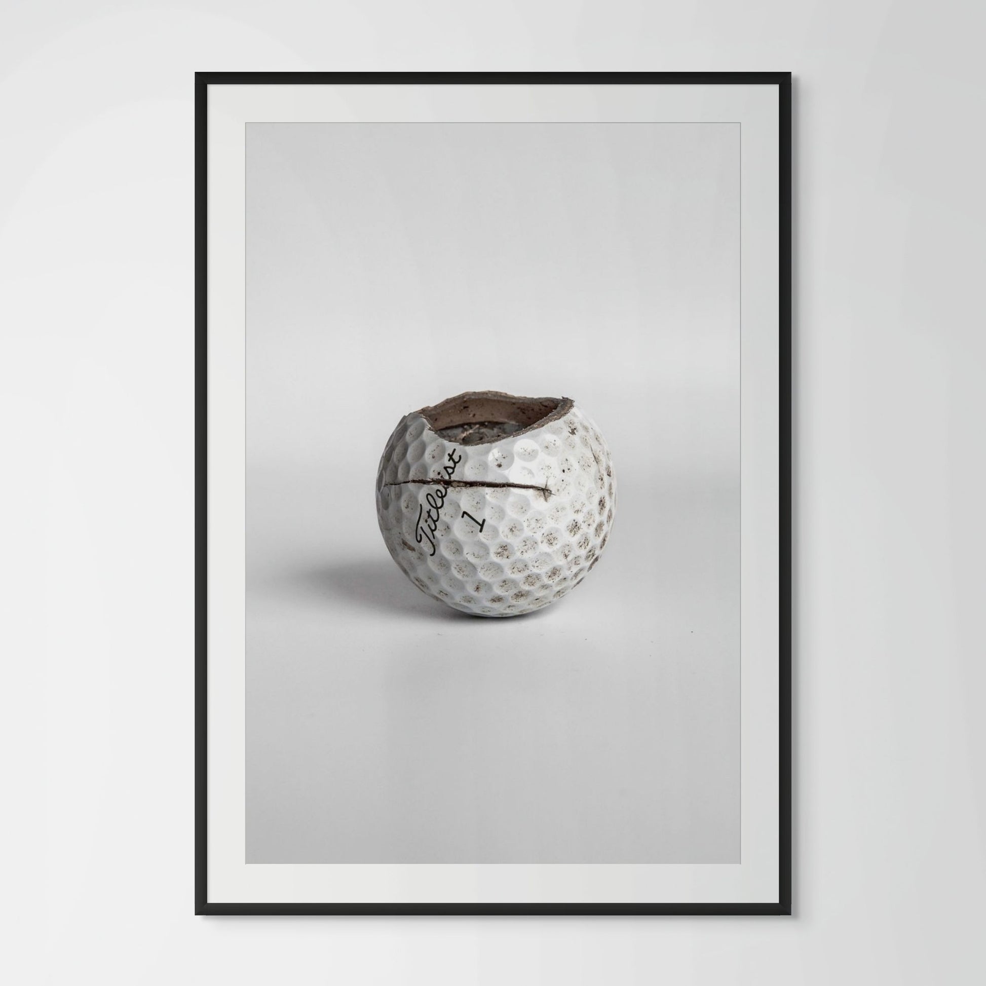 Titleist Pro V1 equator crack golf ball framed photography print in black wood frame