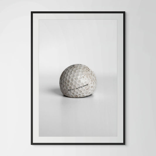 Titleist Pro V1x aged dirty golf ball framed photography print in black wood frame