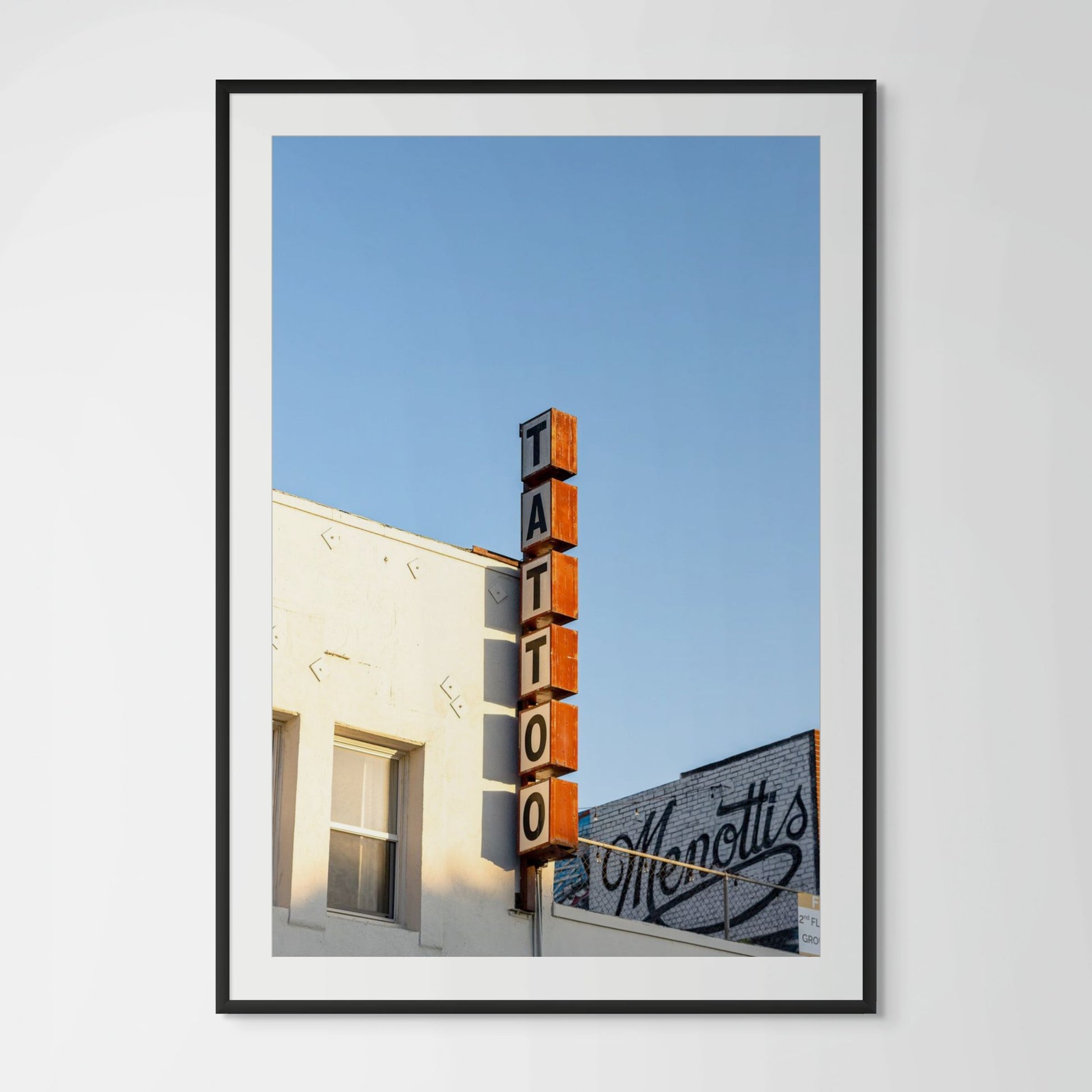 Venice Beach tattoo shop framed photography print in black wood frame with white mat