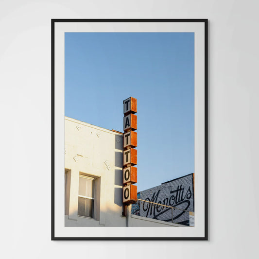 Venice Beach tattoo shop framed photography print in black wood frame with white mat